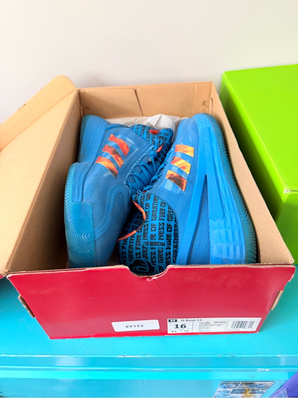 Adidas Blue Basketball Shoes with Orange Accents